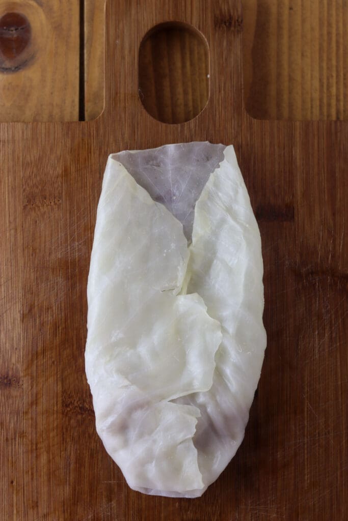 How to stuck the edges of the cabbage leaf to easily roll a cabbage leaf with stuffing into a roll.